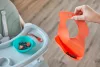 Tommee Tippee Roll n Go műanyag etető előke M