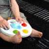 BABY EINSTEIN Zenélő érzékszervi játék Color Palette Popper - 6-36hó
